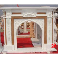 mixed color marble arched fireplace surround